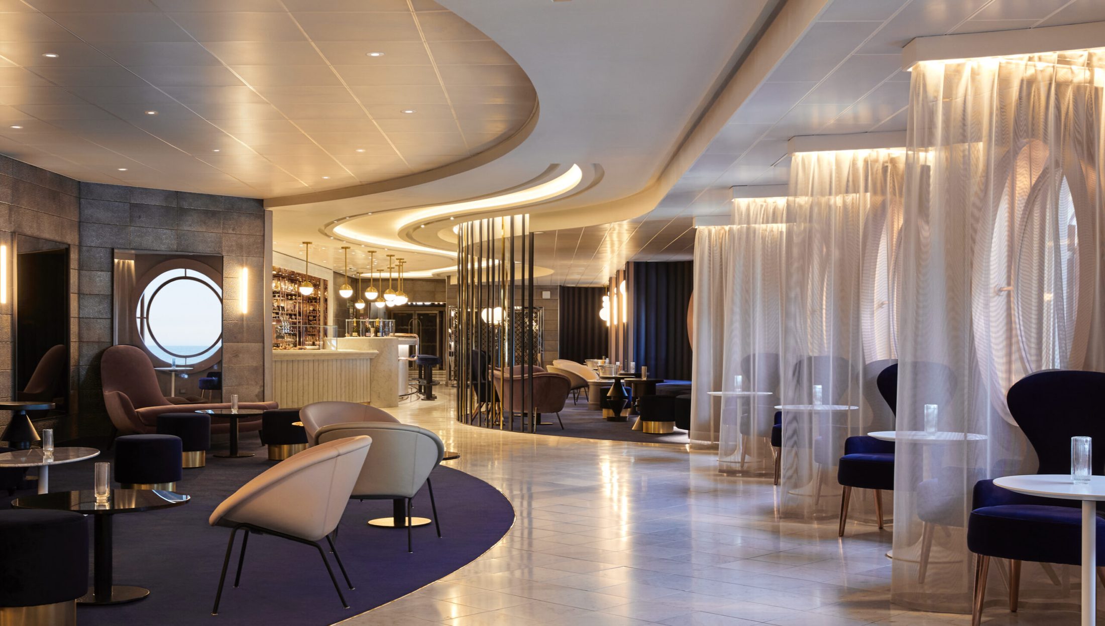 Sip champagne lounge aboard a Virgin Voyages ship