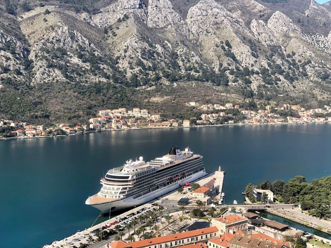 A cruise ship moored in the Bay of Kotor