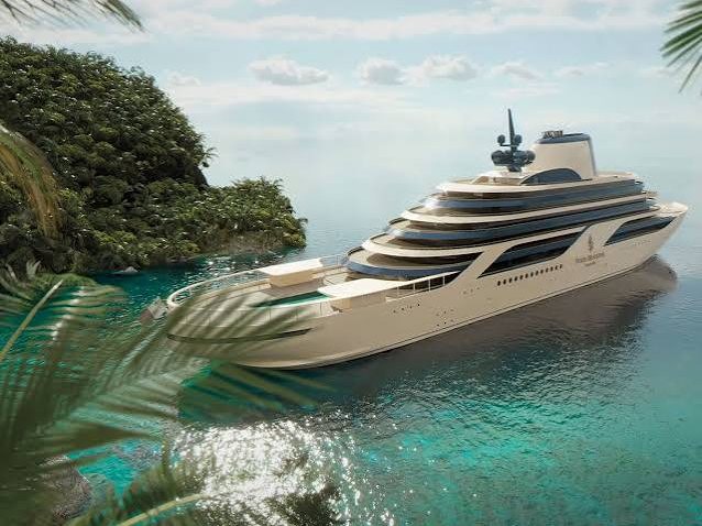 A Four Seasons Yachts vessel at anchor off a tropical coast