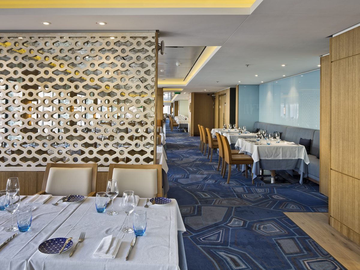 Set tables in a restaurant on board a Viking cruise ship