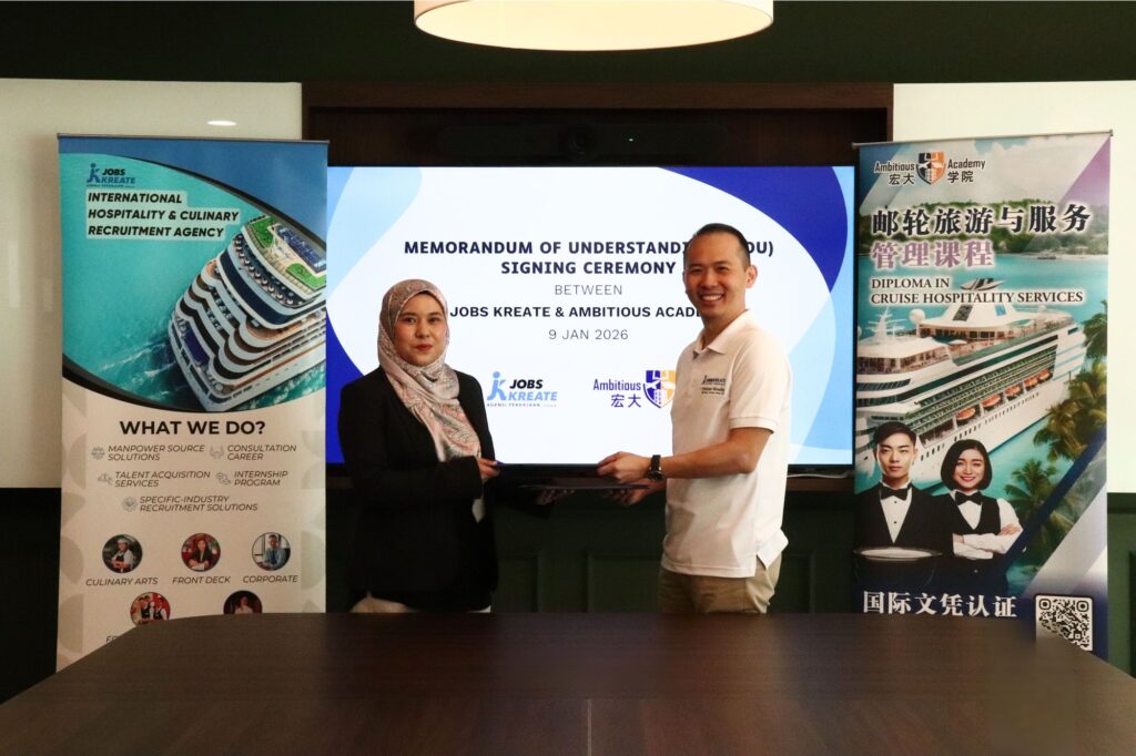 Jobs Kreate and Ambitious Academy principals exchanging the signed Memorandum of Understanding at the 9 January 2026 ceremony.