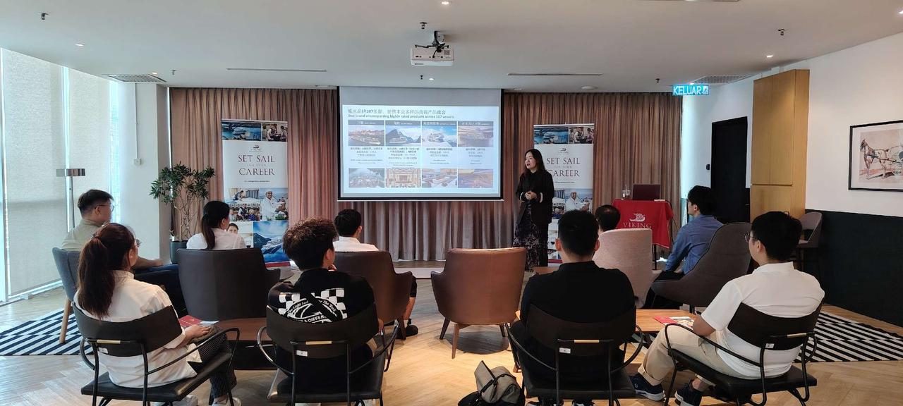 Ms. Heidi from Viking River Cruise presenting to Jobs Kreate shortlisted candidates at the on-ground interview session on 3 December 2025, with Viking Set Sail Career banners and the Viking product slide visible.